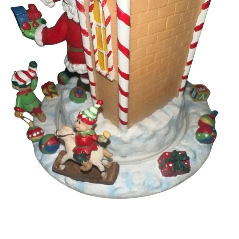 Santa’s workshop ceramic rotating musical decoration by  Home Interiors